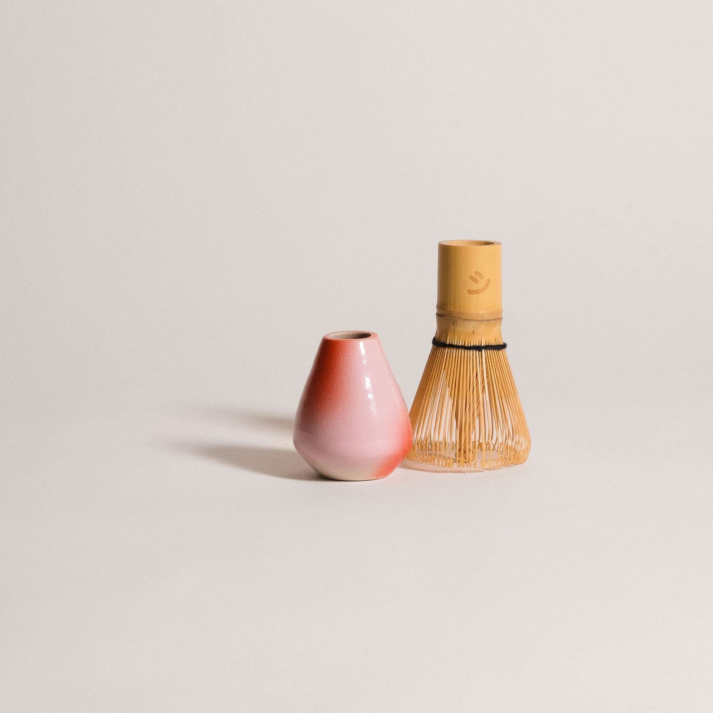 Matcha Set – Gradient - Organic Ceremonial Matcha Supreme featuring a matcha whisk holder and cup in pink and red hues.