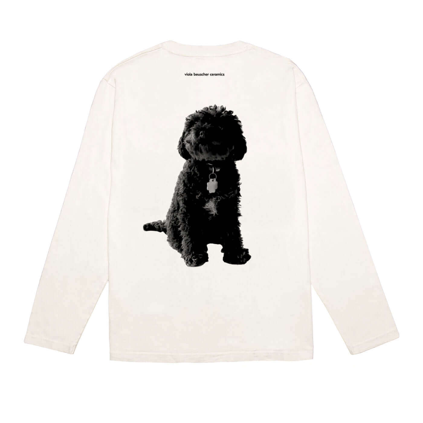 Back view of Rubi Longsleeve shirt featuring a black silhouette print of a poodle on off-white cotton.
