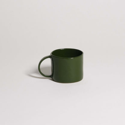 Coffee Mug – Green, handmade stoneware with a glossy green finish, perfect for coffee and tea.