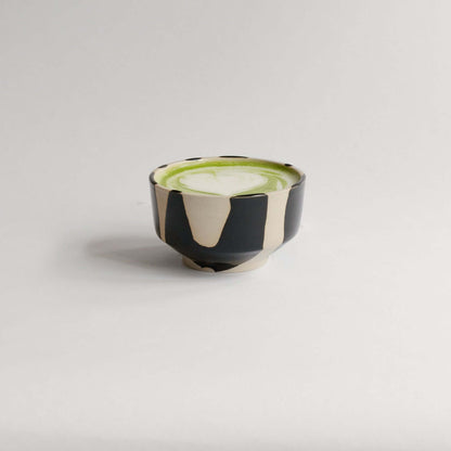 Matcha Set – Otis handcrafted pouring bowl containing vibrant matcha drink.