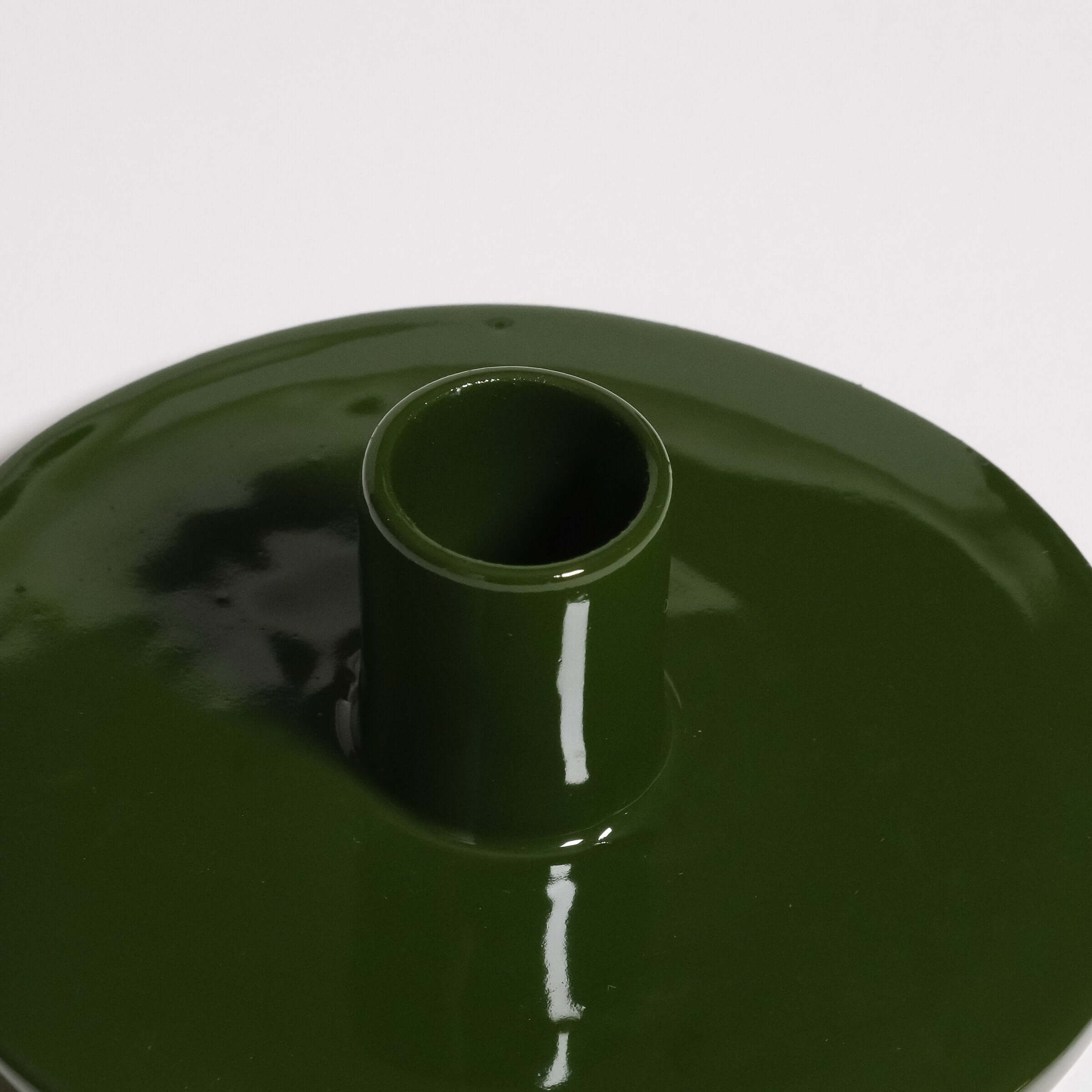 Candle Holder – Green with a smooth, glossy surface for holding a single candle, handmade from stoneware.