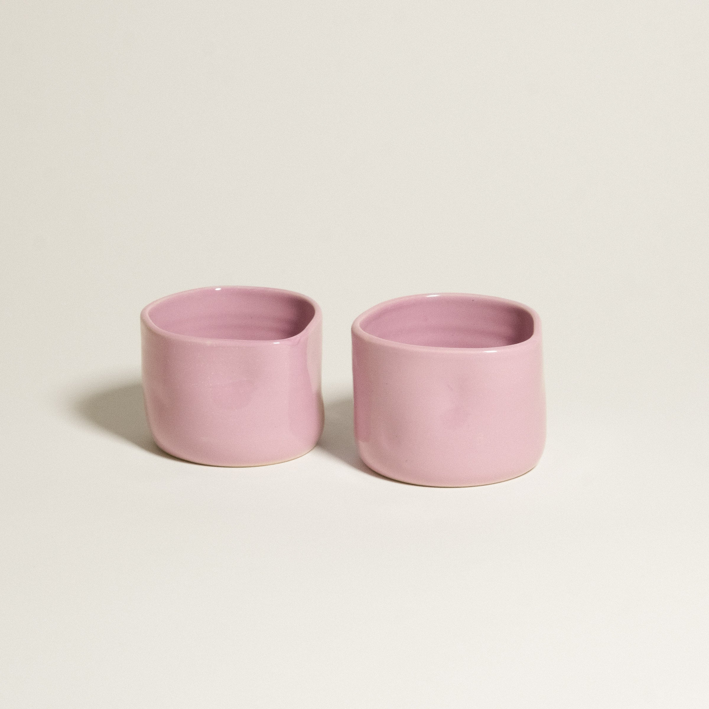 Hojicha Cup – Pink, a pair of glossy pink stoneware cups ideal for serving iced Hojicha.