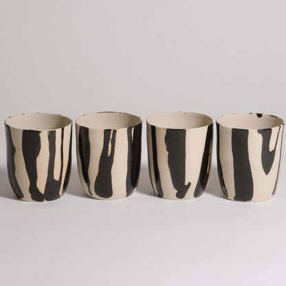 Mix & Match - Cup & Mug Bundle featuring four stylish black and white striped cups.