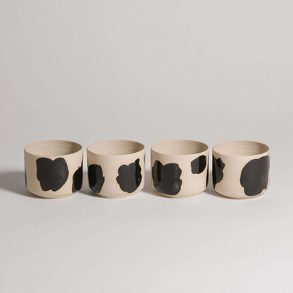Set of 4 grey stoneware coffee cups with glossy black brush strokes, wheel-thrown and hand-painted.