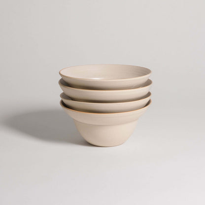 Set of 4 Neo Bowls in White Matte, made of grey stoneware clay with a matte glaze finish.