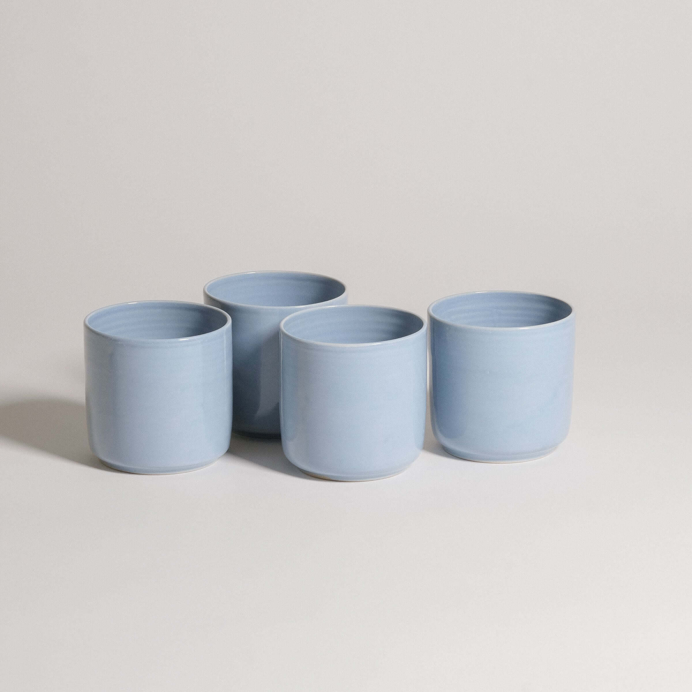 Set of 4 Nomi Iceblue tea cups, handcrafted stoneware ceramic with unique iceblue glaze, dishwasher and oven safe.