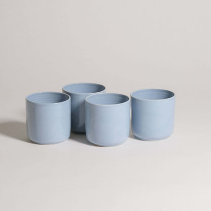 Set of 4 Nomi Iceblue tea cups, handcrafted stoneware ceramic with unique iceblue glaze, dishwasher and oven safe.