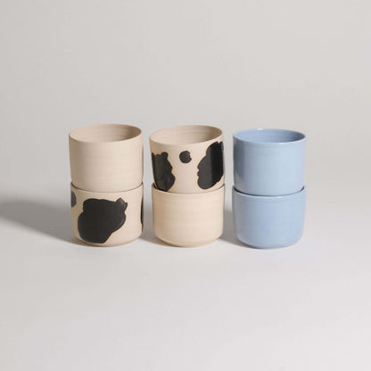 Set of 6 Nomi coffee cups in grey stoneware with glossy interior and black brush strokes outside. Nomi Mix collection.